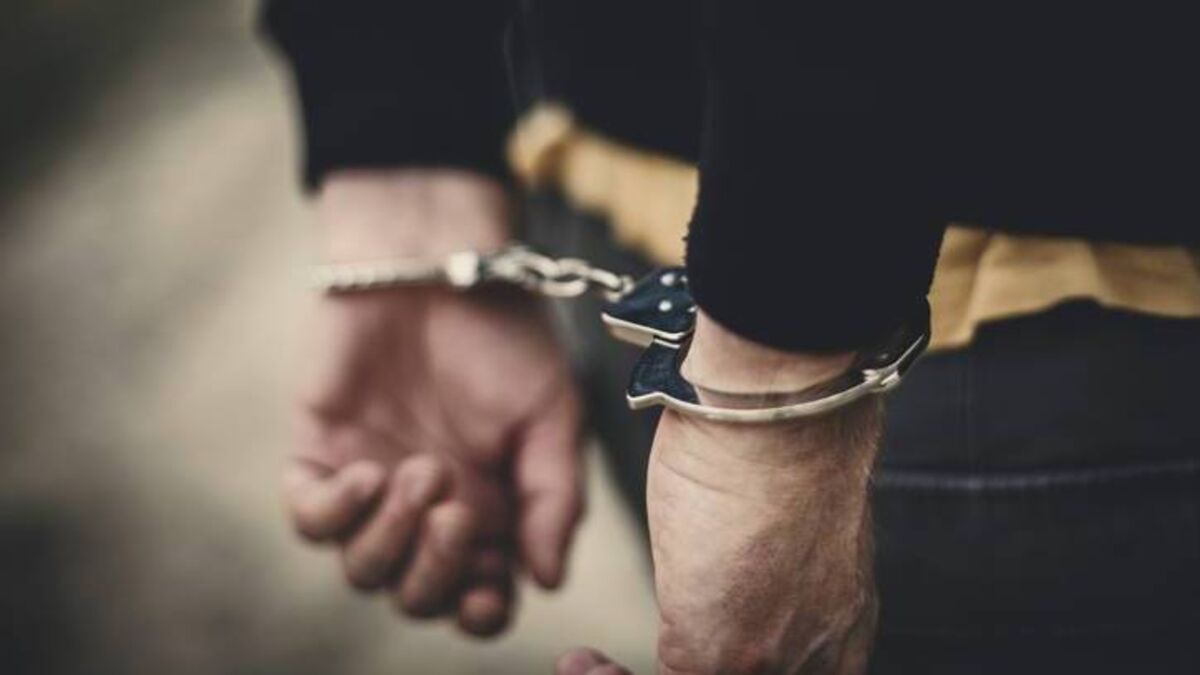 Refugee was handcuffed after threats to fellow residents