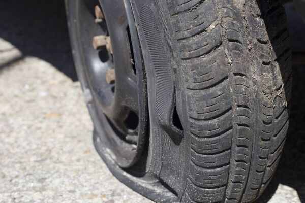 The car's tyres were slashed with a Stanley knife. The car's tyres were slashed with a Stanley knife.
