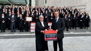 Criminal law barristers stage strike over fees Criminal law barristers stage strike over fees