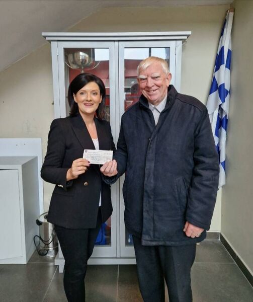 Joanne Byrne being presented with her winnings in the draw of €10,000 by the club draw coordinator and seller of the winning ticket Jimmy Nally. Joanne Byrne being presented with her winnings in the draw of €10,000 by the club draw coordinator and seller of the winning ticket Jimmy Nally.