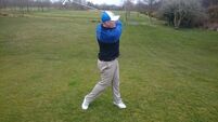 Playing from a slope with the ball above your feet