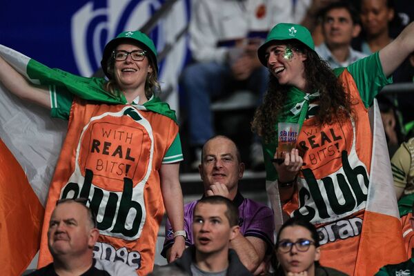 A taste of home: Ireland fans dressed for the occasion at last Saturday night's Rugby World Cup game against Scotland at Stade de France, Paris.	Picture: INPHO/Billy Stickland
