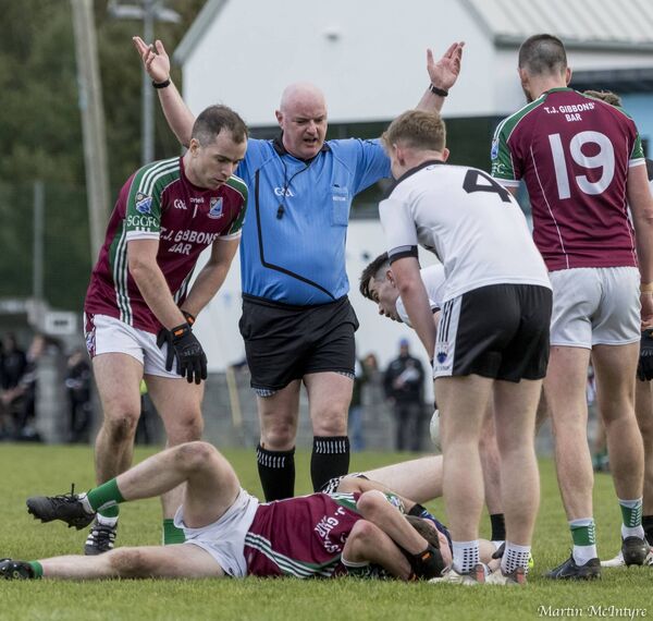 Referee Frank Flynn overseeing the proceedings during last Saturday's hard-fought county junior semi-final clash of Shrule/Glencorrib and Cill Chomáin at St Patrick's Park, Westport.	Picture: Martin McIntyre