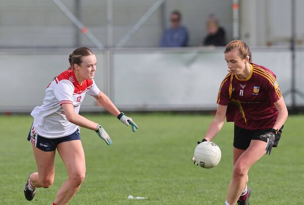 Shauna Maughan of MacHale Rovers tries to get past Sarah Carney of Moy Davitts. Shauna Maughan of MacHale Rovers tries to get past Sarah Carney of Moy Davitts.