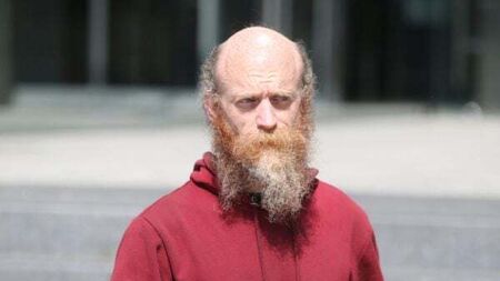 Judge orders arrest of activist who allegedly drove into immigration protesters