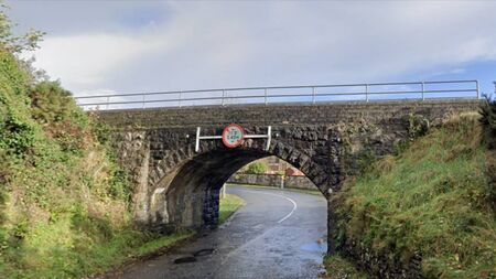 Low railway bridge on busy Westport road is 'safety risk'
