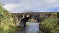 Low railway bridge on busy Westport road is 'safety risk'