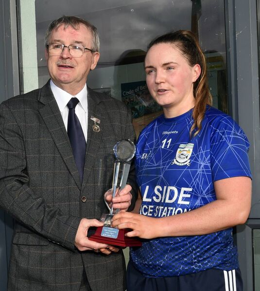 Player of the match, Rebecca Kean of Claremorris, receives her award from Connacht LGFA President, Con Moynihan, in Boyle last Sunday.
