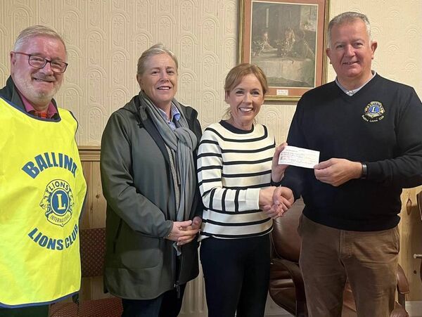 John Carroll (Ballina Lions Club) presenting a cheque for €1500 to Alison Fearon of Ballina Community Centre Meals on Wheels. The funds are part proceeds of Ballina Lions Club Golf Classic. Also pictured are Seamus Rice (left) of Ballina Lions Club and Ann Farrell (second from left) of Ballina Community Centre Board of Directors. 