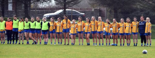 The Knockmore squad stands for the national anthem prior to the start of the Connacht LGFA senior club championship final. 