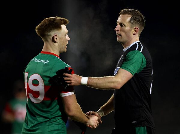 Ballina’s Sean Regan and David Connern of Fulham Irish after the game.	Picture: INPHO/James Crombie