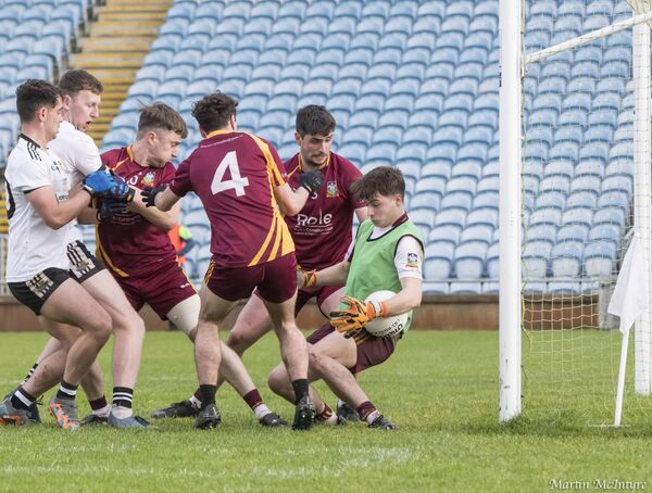 Annaduff's Caolan Quigley and his defenders mind their goal under pressure from Kilmeena's Keith Joyce and Caolach Halligan.