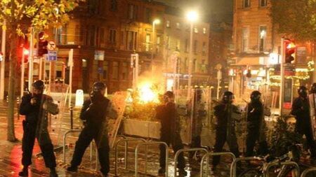 Calls for calm amid 'disgraceful scenes' after children injured in knife attack