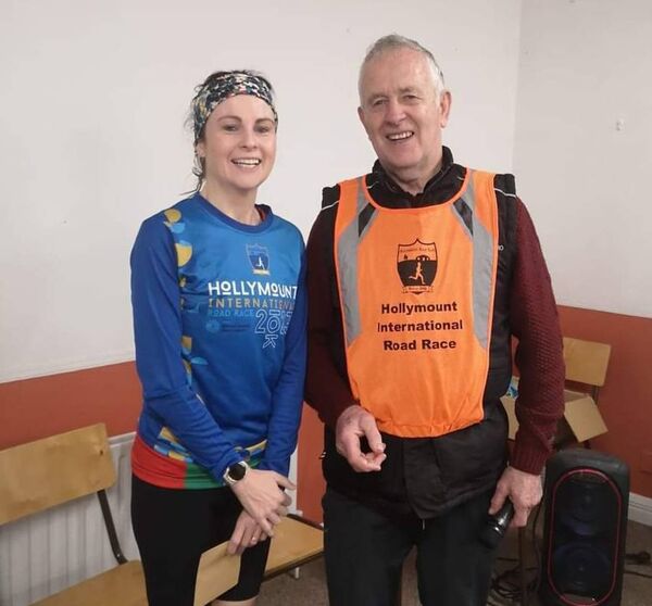 Mayo AC's Donna Gallagher receives her prize as over-40s winner from Hollymount organiser Sean Reilly. 