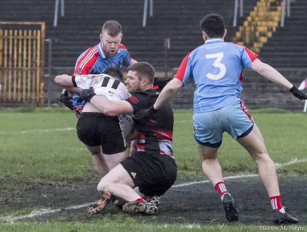 Monivea-Abbey goalkeeper Denis Farragher fouls Kilmeena captain Sean Ryder in the closing moments, only to save the resultant penalty and secure a one point win for his team.
