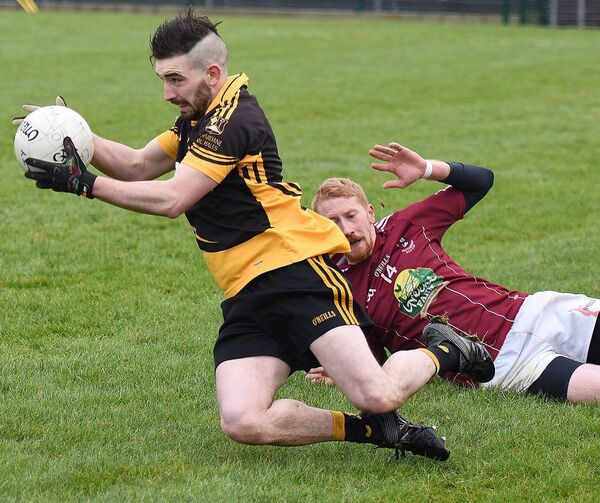 Chris Rowland is tackled by Max Brady of Multyfarnham during Lahardane's All-Ireland Club junior semi-final in 2017. Chris Rowland is tackled by Max Brady of Multyfarnham during Lahardane's All-Ireland Club junior semi-final in 2017.