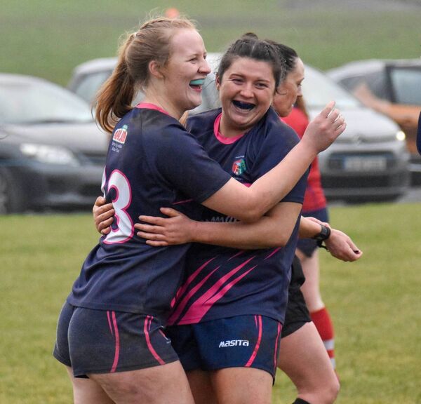 Éabha Nic Dhonnacha and Sarah-Jane Fox embrace after Saturday's victory over UL Bohemians.
