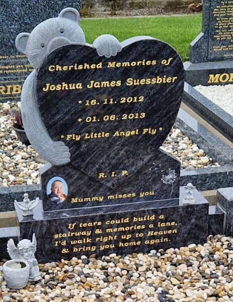 Baby Joshua's new headstone. Baby Joshua's new headstone.