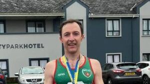 Sports briefs: Griffin finishes third in marathon, big trophy haul for Mayo Karate Academy