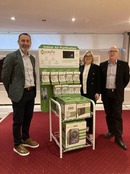 Lorraine Burnell is pictured with Padraig O'Hara and John Heenan of pureAir.