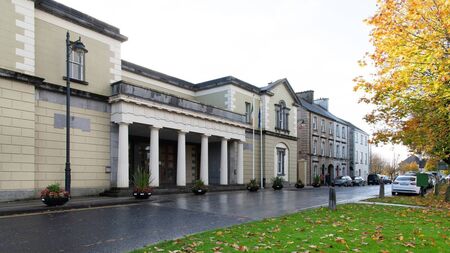 Three injured when banned driver 'ploughed' into car