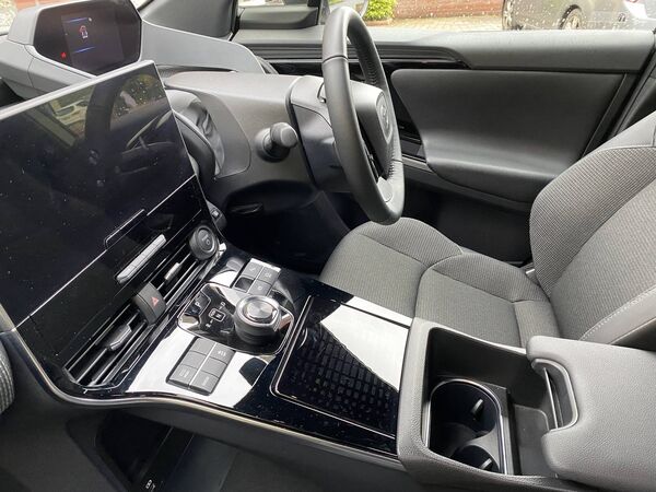 The driver’s seat has power adjustments and lumbar support, the other front seat has manual settings. 