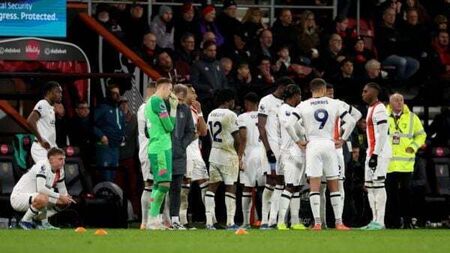 Premier League match abandoned after captain collapses on pitch