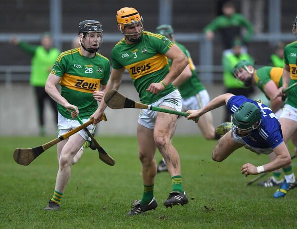 Tooreen’s Fergal Boland takes a tumble in mid-air following a challenge from Castlelyons full-back Colm Barry. Tooreen’s Fergal Boland takes a tumble in mid-air following a challenge from Castlelyons full-back Colm Barry.