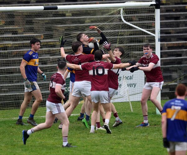 Mayo Gaels goalkeeper Jarlath Judge comes under pressure from Crossmolina players during the first-half of Sunday's final.