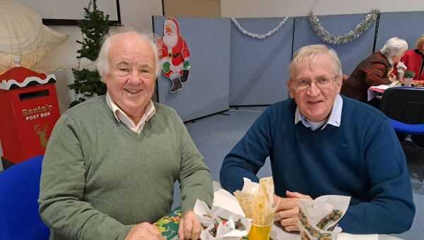 Catching up at the recent community Christmas lunch held in Charlestown Town Hall Arts Centre 