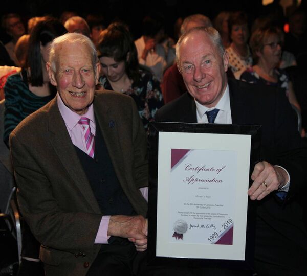 Michael J Reidy, who designed the Claremorris Town Hall, is pictured receiving an Appreciation Award from Minister for Rural and Community Development Michael Ring at the golden jubilee celebrations in 2019. Picture: Trish Forde