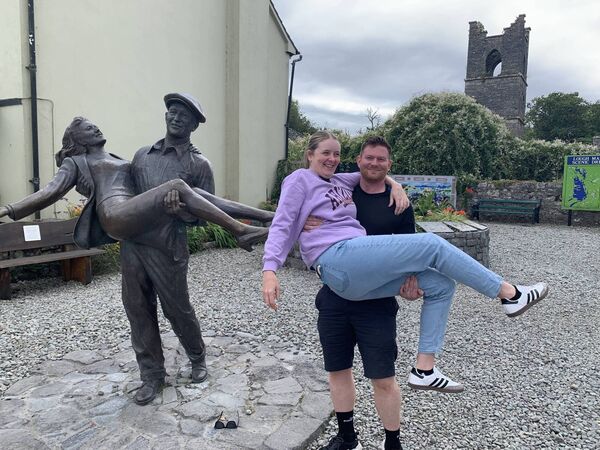 Melissa and Richard Collins, from Chester in the UK, imitate the pose of John Wayne and Maureen O’Hara at the statue of the actors from ‘The Quiet Man’ film. Melissa and Richard Collins, from Chester in the UK, imitate the pose of John Wayne and Maureen O’Hara at the statue of the actors from ‘The Quiet Man’ film.