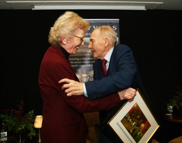 Henry Wills is congratulated by former President of Ireland Mary Robinson at the launch of his book, In All Kinds of Weather, last November. Picture: John O'Grady