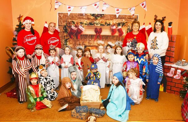 Children from Naí­onra Ballina enjoying their Christmas Nativity with teachers Katelyn Moran, Irene Tighe, Christine Noone and Shauneen Quinn. 	 Picture: John O'Grady