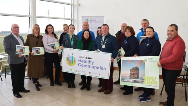 Launching the Slainte Care Healthy Communities Calendar recently in Belmullet Civic Centre is Councillor Sean Carey with representatives from the HSE, Slainte Care, and Mayo North East Erris CFSC, Údarás and Others. The calendar is freely available in all outlets with beautiful images of Erris.