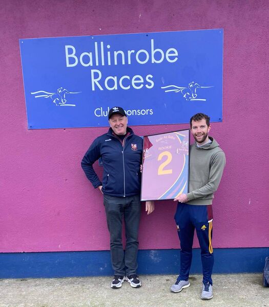 Felim Reilly (right) pictured with John Sweeney, chairman, Ballinrobe GAA Club, after a presentation made to mark Felim’s 15-year career as an adult footballer in the club. Felim Reilly (right) pictured with John Sweeney, chairman, Ballinrobe GAA Club, after a presentation made to mark Felim’s 15-year career as an adult footballer in the club.