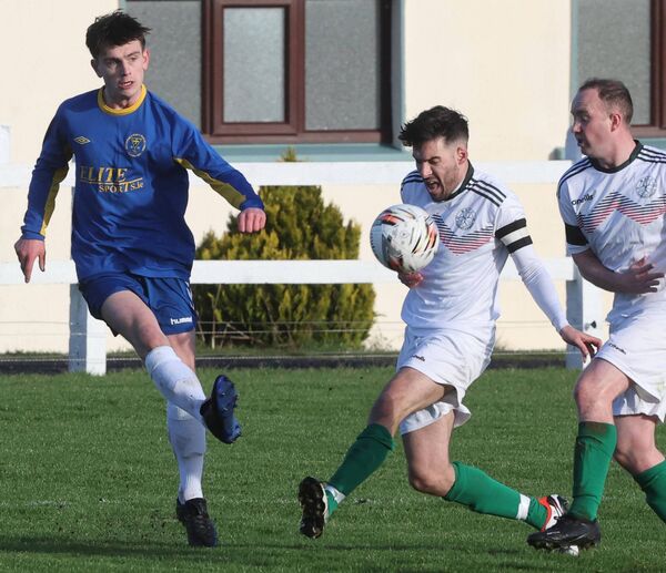 Mayo captain Cillian McGlade attempts to block a shot from Roscommon's Adam Farrell. Mayo captain Cillian McGlade attempts to block a shot from Roscommon's Adam Farrell.