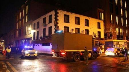 Army bomb disposal team carries out controlled explosion at homeless hostel
