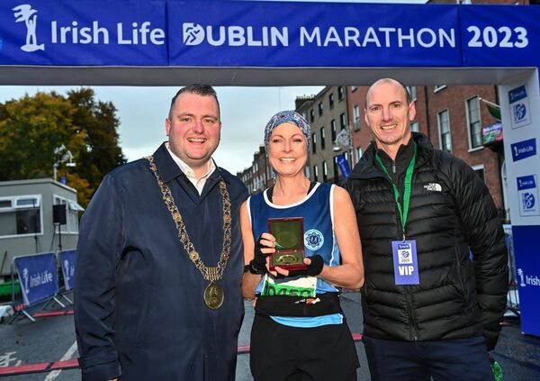 Rita Casey with Daithí de Róiste and John Casey.