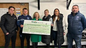 Local Notes: Kiltimagh GAA Club present a cheque to Mayo Roscommon Hospice and Mayo Neurone Disease Association