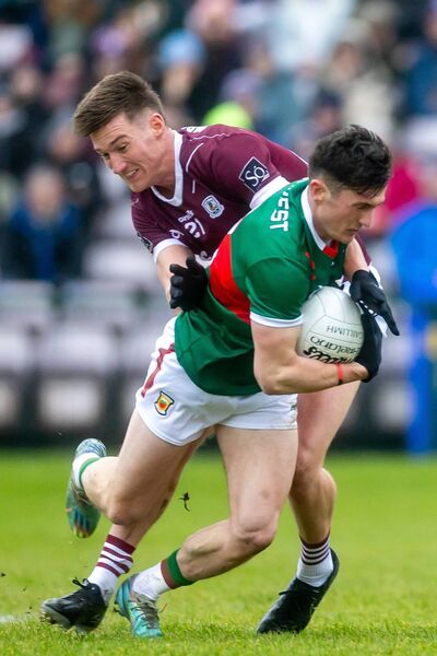 Galway’s Niall Daly tackles Mayo corner-back Jack Coyne. Galway’s Niall Daly tackles Mayo corner-back Jack Coyne.