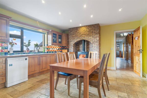 The kitchen has a stove.