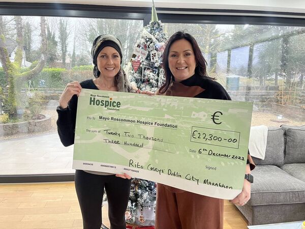 Rita Casey presents the cheque for €22,300 to Martina Jennings, Mayo Roscommon Hospice.