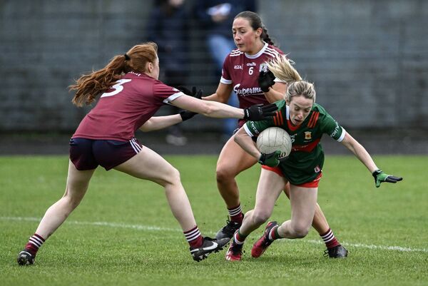 Mayo's two-goal hero Lisa Cafferky in action against Sarah Ní Loingsigh, left, and Kate Geraghty of Galway. Mayo's two-goal hero Lisa Cafferky in action against Sarah Ní Loingsigh, left, and Kate Geraghty of Galway.