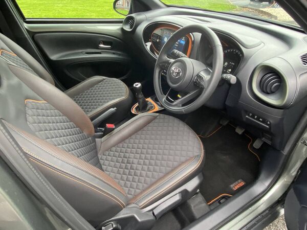 The interior is cheerful and colourful with strong curves on the dash and door trims. The interior is cheerful and colourful with strong curves on the dash and door trims.