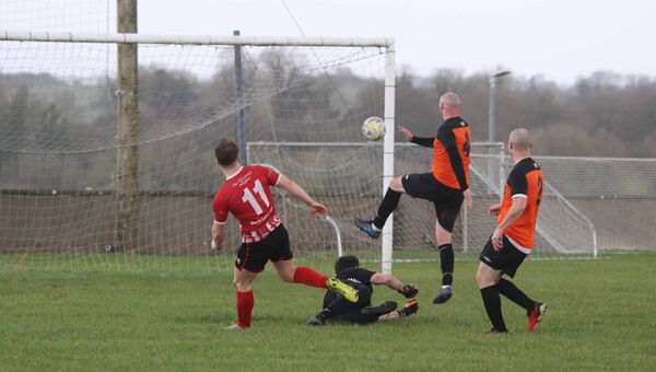 Ballyglass number 11, Phelim Prendergast chips the ball over the Corrib Rangers keeper to put his team 3-1 up. The Swans won out on a 3-2 score line. Picture by Tom Quinn