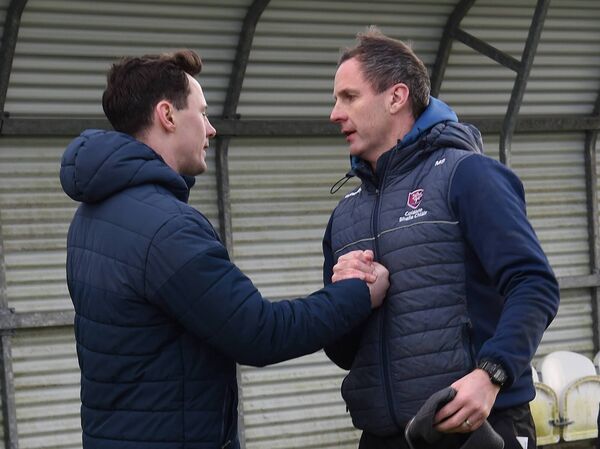Diarmuid O’Connor, left, coach and teacher at St Gerald's College, Castlebar with Coláiste Bhaile Chláir manager Maurice Sheridan at the final whistle of last Sunday's Connacht PPS senior 'A' final.	Picture: David Farrell Photography 