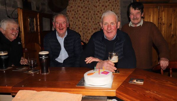 Michael Staunton, Castlecarra, celebrated a significant birthday in Hughes Pub Carnacon, recently and was ably assisted in blowing out the candles by Denis Biggins, Francie Hughes and Sean Fox. Picture by Tom Quinn. 