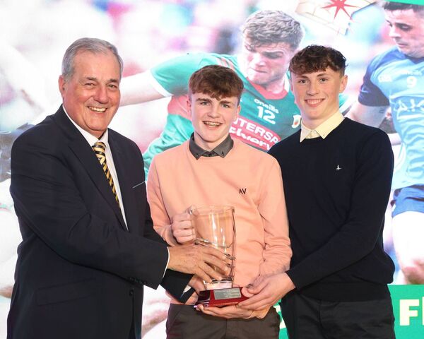 Dylan Flynn and Kobe McDonald accept the Gaelic football award on behalf of Jordan Flynn from RTÉ's legendary Gaelic games commentator Ger Canning. Picture: Michael Donnelly Dylan Flynn and Kobe McDonald accept the Gaelic football award on behalf of Jordan Flynn from RTÉ's legendary Gaelic games commentator Ger Canning. Picture: Michael Donnelly