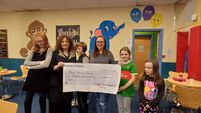 Local Notes: Clogher Environmental Group present cheque to Mayo Autism Camp